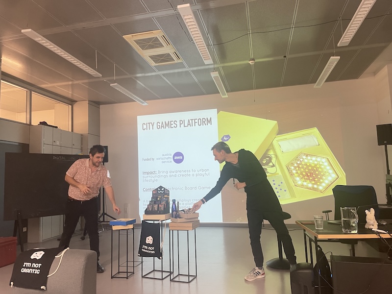 Tamer and Philipp are showing us their board game for the city and talk about other projects of City Games Vienna.